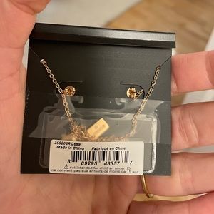 Coach necklace and earrings - rose gold